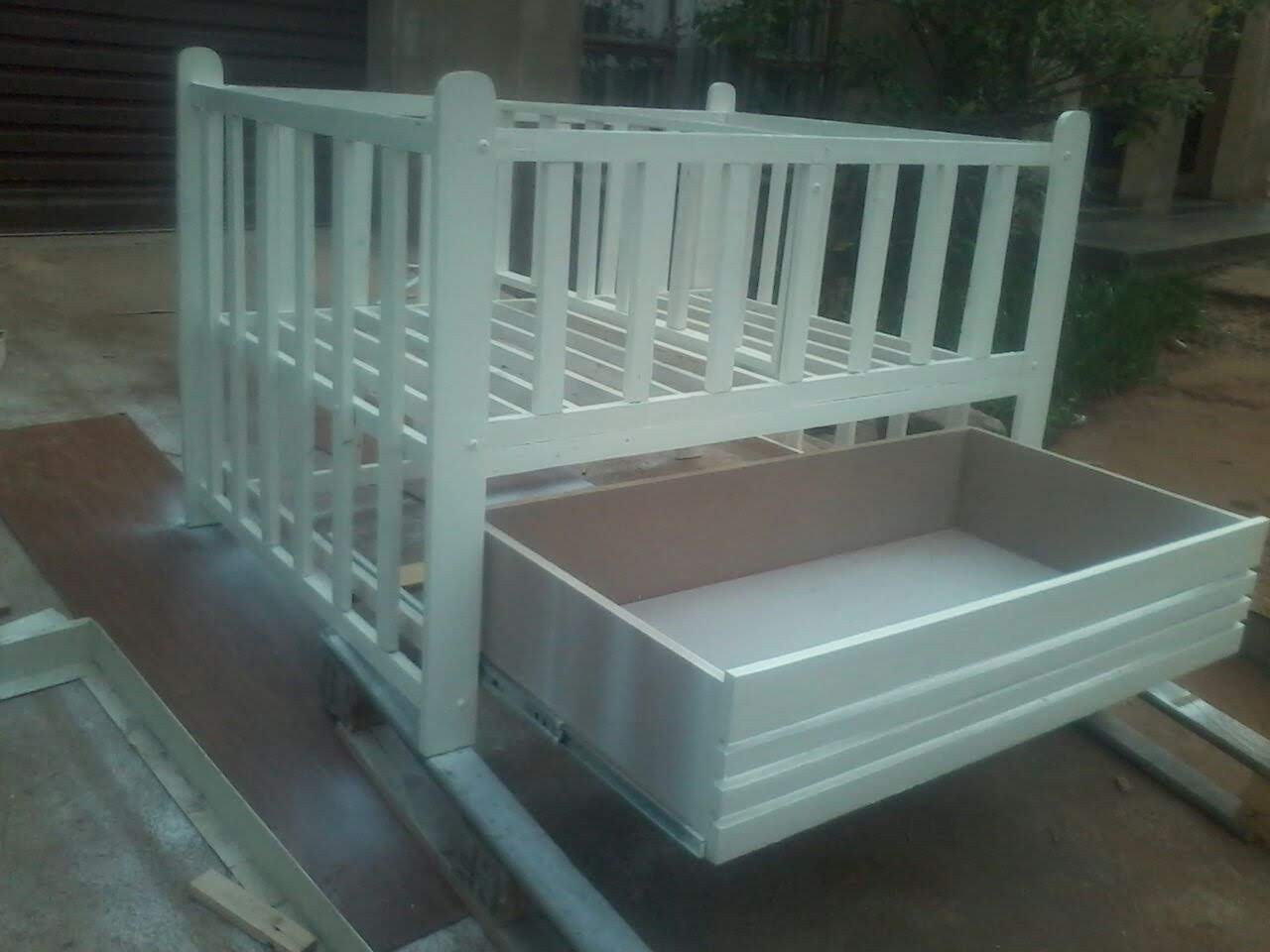 Custom cot and drawers built by Berachas Wood Works